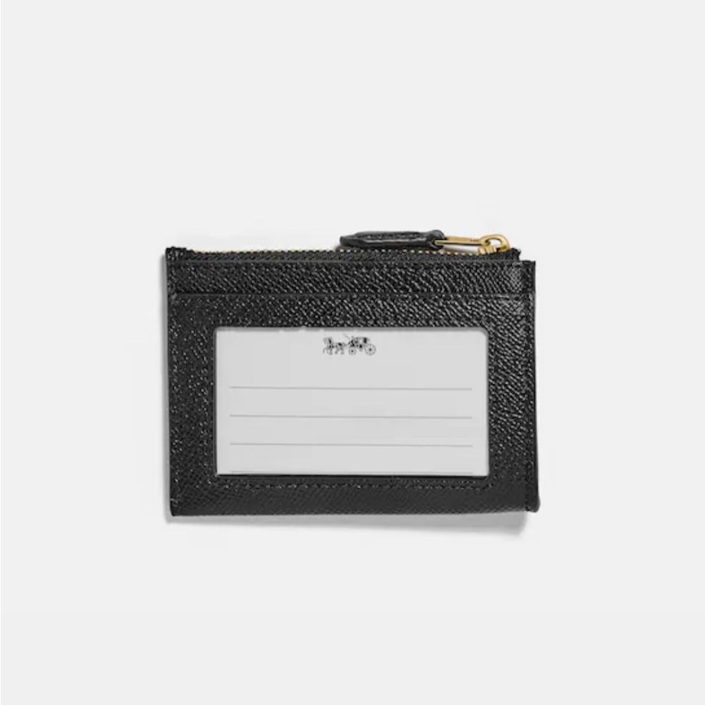 Brand new Coach Mini Skinny ID Case in Gold/Black
